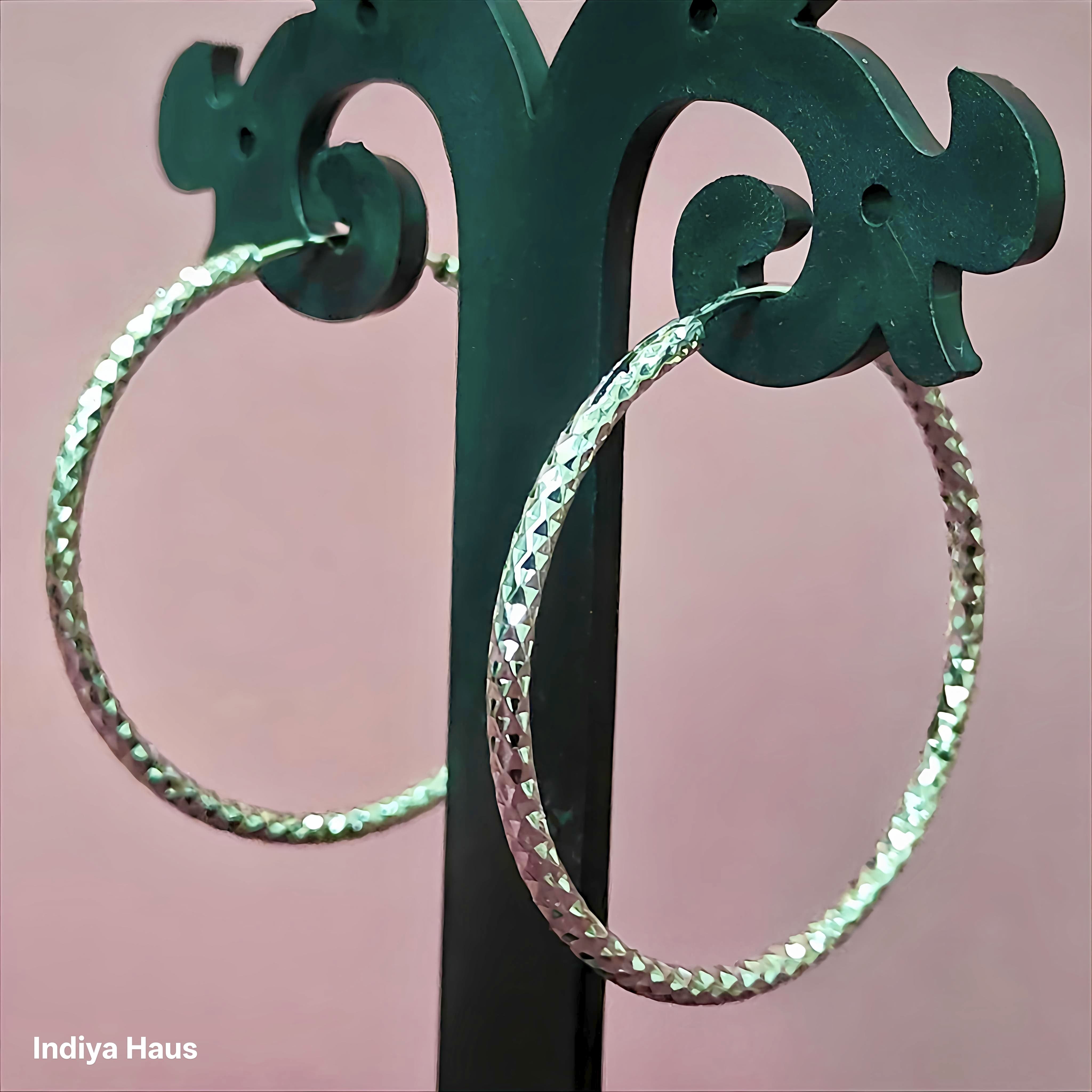 Dazzling Faceted Silver Hoop Earrings