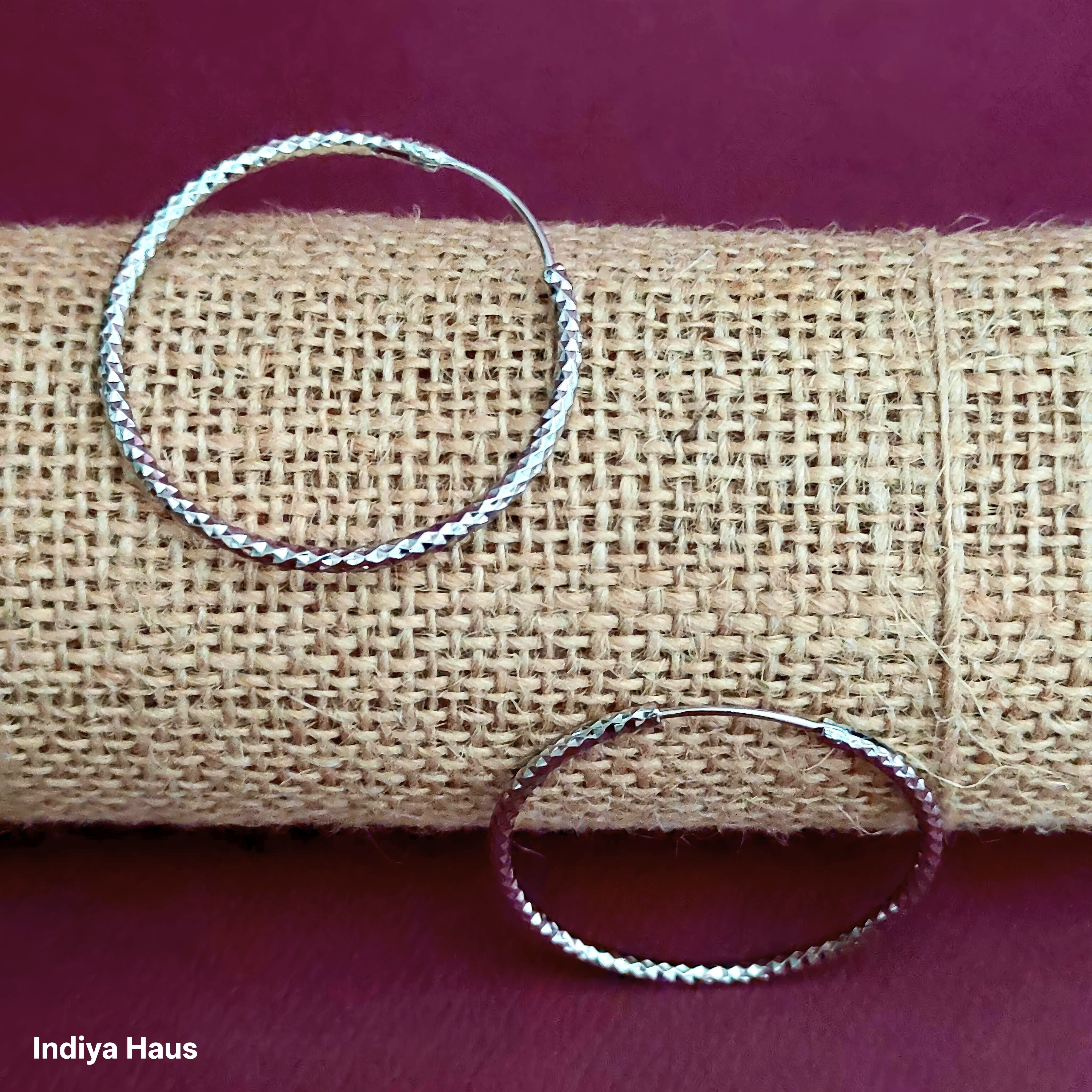 Dazzling Faceted Silver Hoop Earrings